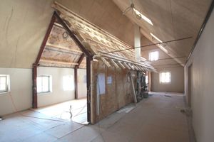  Der Stahlrahmen für die Kinderbücherei wurde mit Holz verkleidet Foto: Schlicht Lamprecht Architekten 