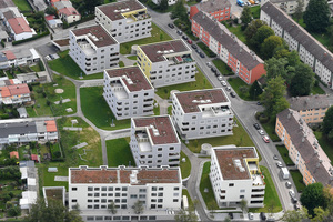  Das Iser-Quartier in Neugablonz besteht aus sieben modernen Punkthäusern und einem Langhaus. Die Gebäude gliedern sich aufgrund ihrer Farbgestaltung perfekt in die Umgebung ein 