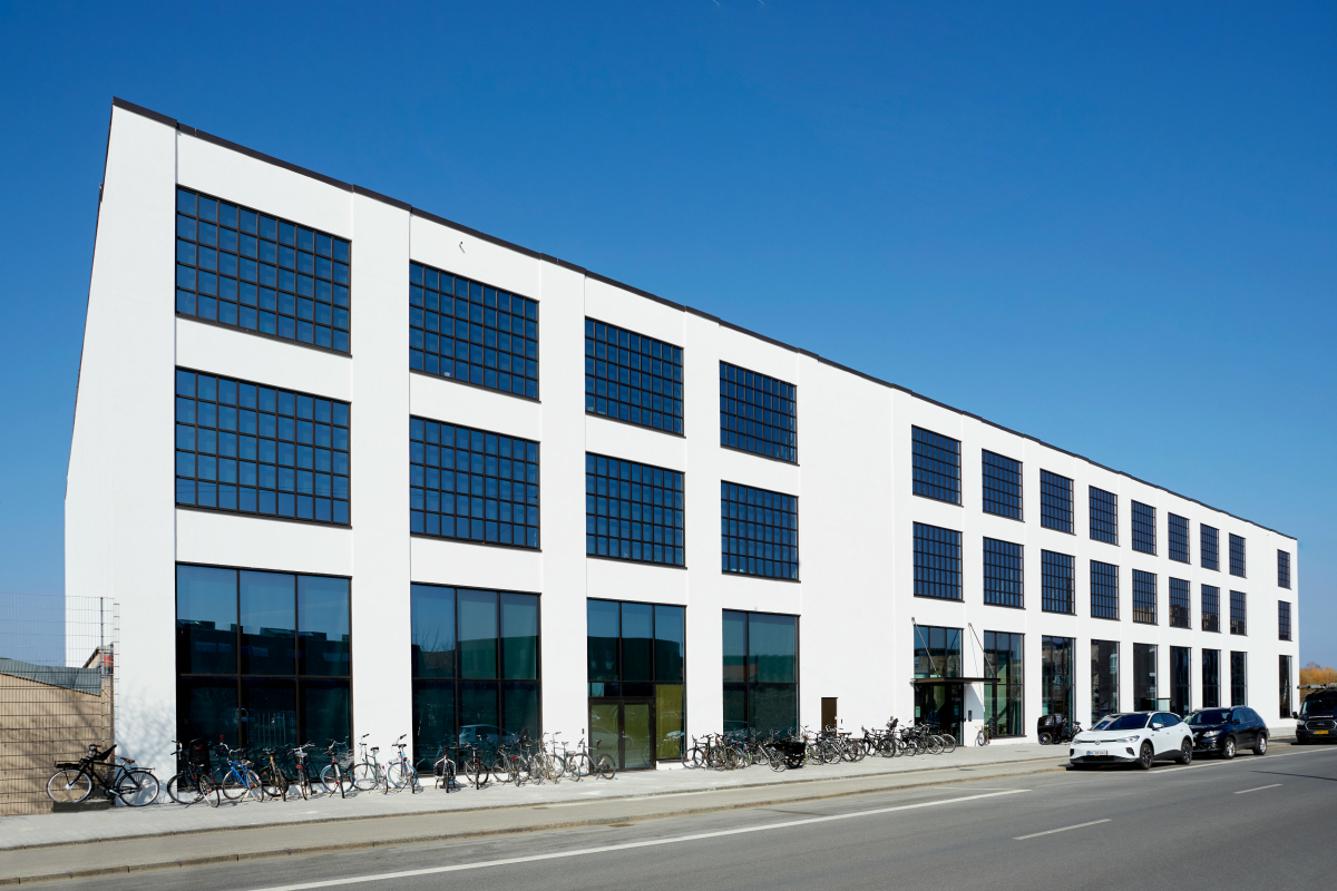 Moderne Büros im transformierten Lagerbau: Mit dem Umbau des Industriegebäudes wurde ein abrissgefährderter Altbau erhalten