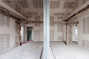  Ein komplexes Sonderdetail entwickelten die Ausbauprofis gemeinsam mit den Technikern von Rigips für den Dachanschluss der feuerbeständigen Wohnungstrennwände, die als beidseitig mit 2  12,5 mm ?Rigips Die Harte? beplankte Metall-Doppelständerwände im ?S 
