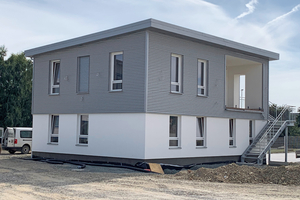  Erstes Gebäude mit formgepressten Lehmsteinen, bemessen nach DIN 18940 