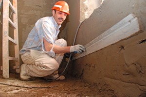  Putzarbeiten auf der Baustelle des ehemaligen Hauses der Einheit 