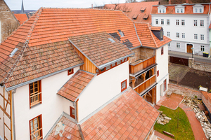  Rechts: Nach dem Abriss der Anbauten steht das Fachwerkhaus wieder nach allen Seiten frei 