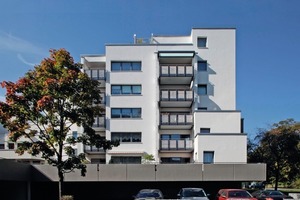  Die Ostfassade eines der drei Wohngebäude aus der Mitte der 1970er Jahre in Kassel nach Abschluss der SanierungsarbeitenFoto: Jörg Lantelmé 